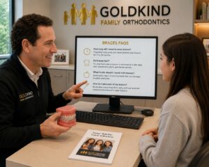 Orthodontist answering braces FAQs during consultation